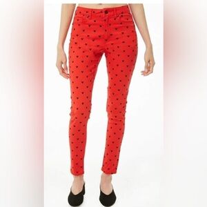 Forever 21 x Disney red skinny pants with a black Mickey Mouse Sz S